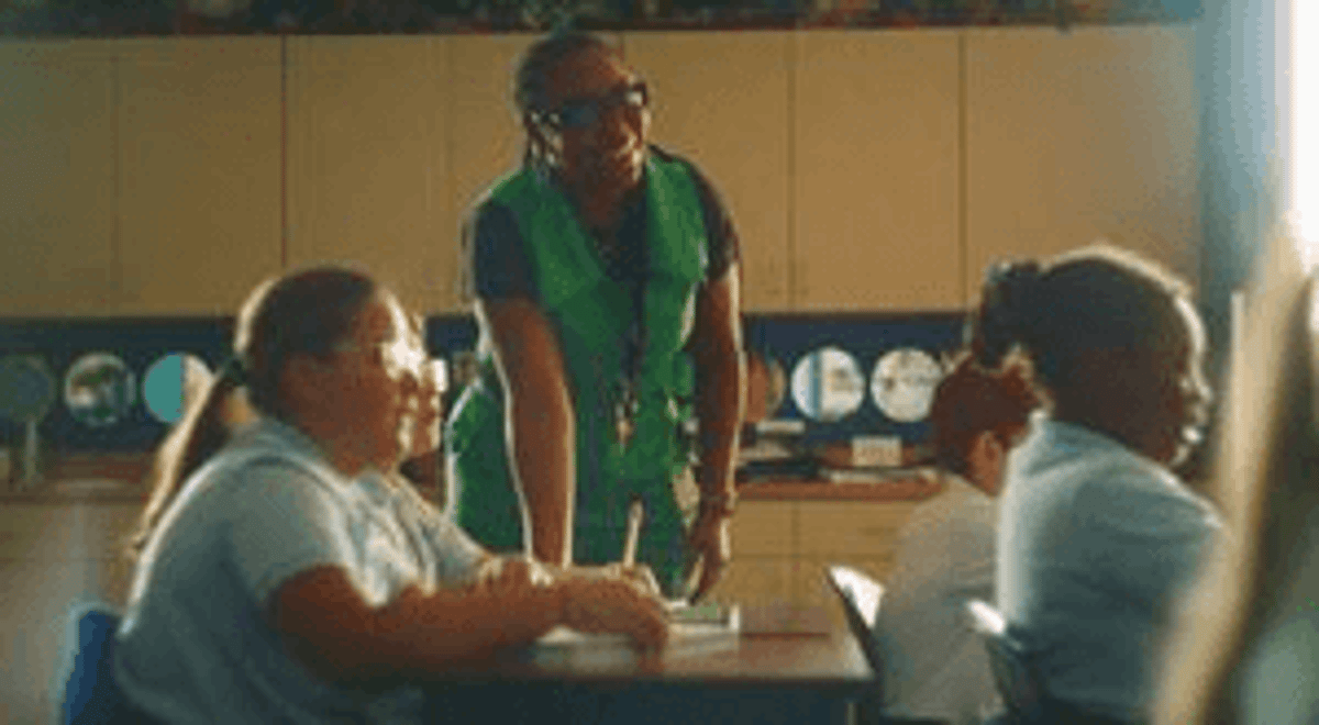 A teacher with her students